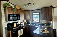 WATERFRONT! NEW LISTING!!  Site #1025- 2016 Northlander Escape, 2 bed, Pebble Beach