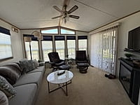 NEW LISTING!! SITE #64- 2002 NORTHLANDER MEADOWBROOK- 14'x39'- 1 BED WITH LARGE SUNROOM