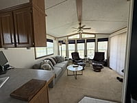 NEW LISTING!! SITE #64- 2002 NORTHLANDER MEADOWBROOK- 14'x39'- 1 BED WITH LARGE SUNROOM