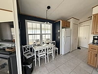 NEW LISTING!! SITE #64- 2002 NORTHLANDER MEADOWBROOK- 14'x39'- 1 BED WITH LARGE SUNROOM