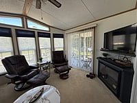 NEW LISTING!! SITE #64- 2002 NORTHLANDER MEADOWBROOK- 14'x39'- 1 BED WITH LARGE SUNROOM