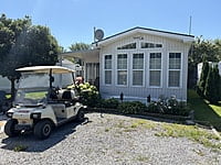 NEW LISTING!! SITE #64- 2002 NORTHLANDER MEADOWBROOK- 14'x39'- 1 BED WITH LARGE SUNROOM