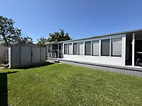 NEW LISTING!! SITE #64- 2002 NORTHLANDER MEADOWBROOK- 14'x39'- 1 BED WITH LARGE SUNROOM