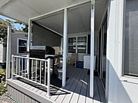 NEW LISTING!! SITE #64- 2002 NORTHLANDER MEADOWBROOK- 14'x39'- 1 BED WITH LARGE SUNROOM
