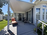 NEW LISTING!! SITE #64- 2002 NORTHLANDER MEADOWBROOK- 14'x39'- 1 BED WITH LARGE SUNROOM