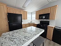 Site #83-2004 Northlander Classic-Site #83-2 bed-14'X39'-Main Park