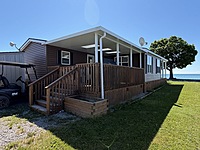 NEW PRICE!!!  Site #1045-WATERFRONT-2016 Northlander Escape-1 1/2 wide-3 bed-Pebble Beach