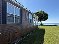 NEW PRICE!!!  Site #1045-WATERFRONT-2016 Northlander Escape-1 1/2 wide-3 bed-Pebble Beach