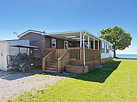 NEW PRICE!!!  Site #1045-WATERFRONT-2016 Northlander Escape-1 1/2 wide-3 bed-Pebble Beach