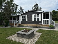 Site #49- 2014 NORTHLANDER ESCAPE, 1 1/2 WIDE, 2 BED- MAIN PARK
