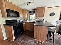 Site #49- 2014 NORTHLANDER ESCAPE, 1 1/2 WIDE, 2 BED- MAIN PARK