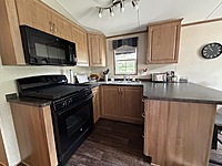 Site #49- 2014 NORTHLANDER ESCAPE, 1 1/2 WIDE, 2 BED- MAIN PARK