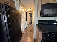 Site #49- 2014 NORTHLANDER ESCAPE, 1 1/2 WIDE, 2 BED- MAIN PARK