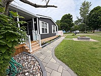 Site #49- 2014 NORTHLANDER ESCAPE, 1 1/2 WIDE, 2 BED- MAIN PARK