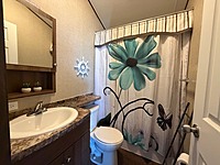 SITE #1079-NEW LISTING-2016 NORTHLANDER ESCAPE-12'x52'-WATERFRONT-PEBBLE BEACH-2 BED, QUAD BUNKS